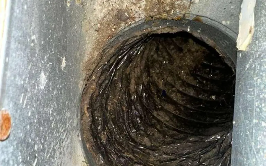 Duct connection with rust staining found during inspection